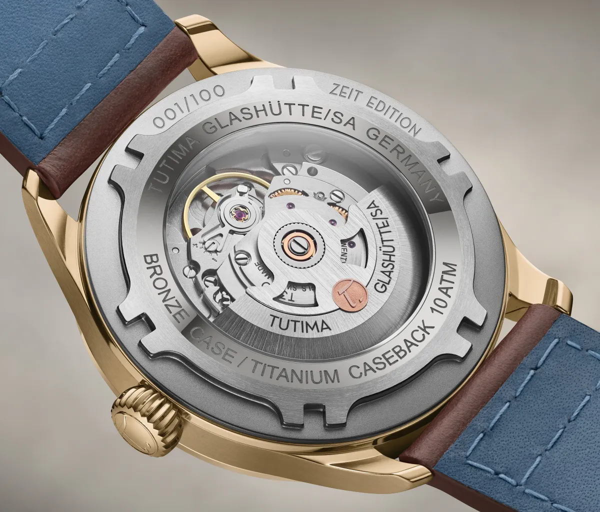 Caliber 330 automatic movement — caseback view through sapphire glass, Glashütte finishing, TUTIMA GLASHÜTTE/SA