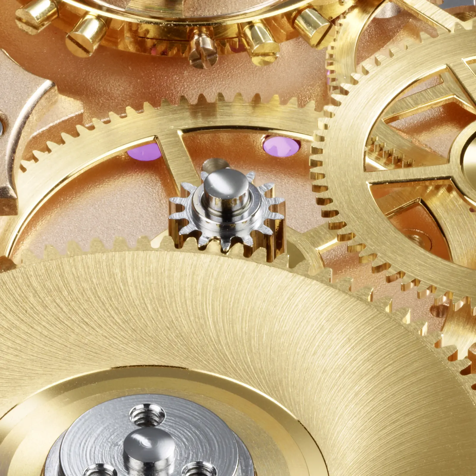 Caliber 800 — gold gear train and mainspring barrel, jewel bearings visible