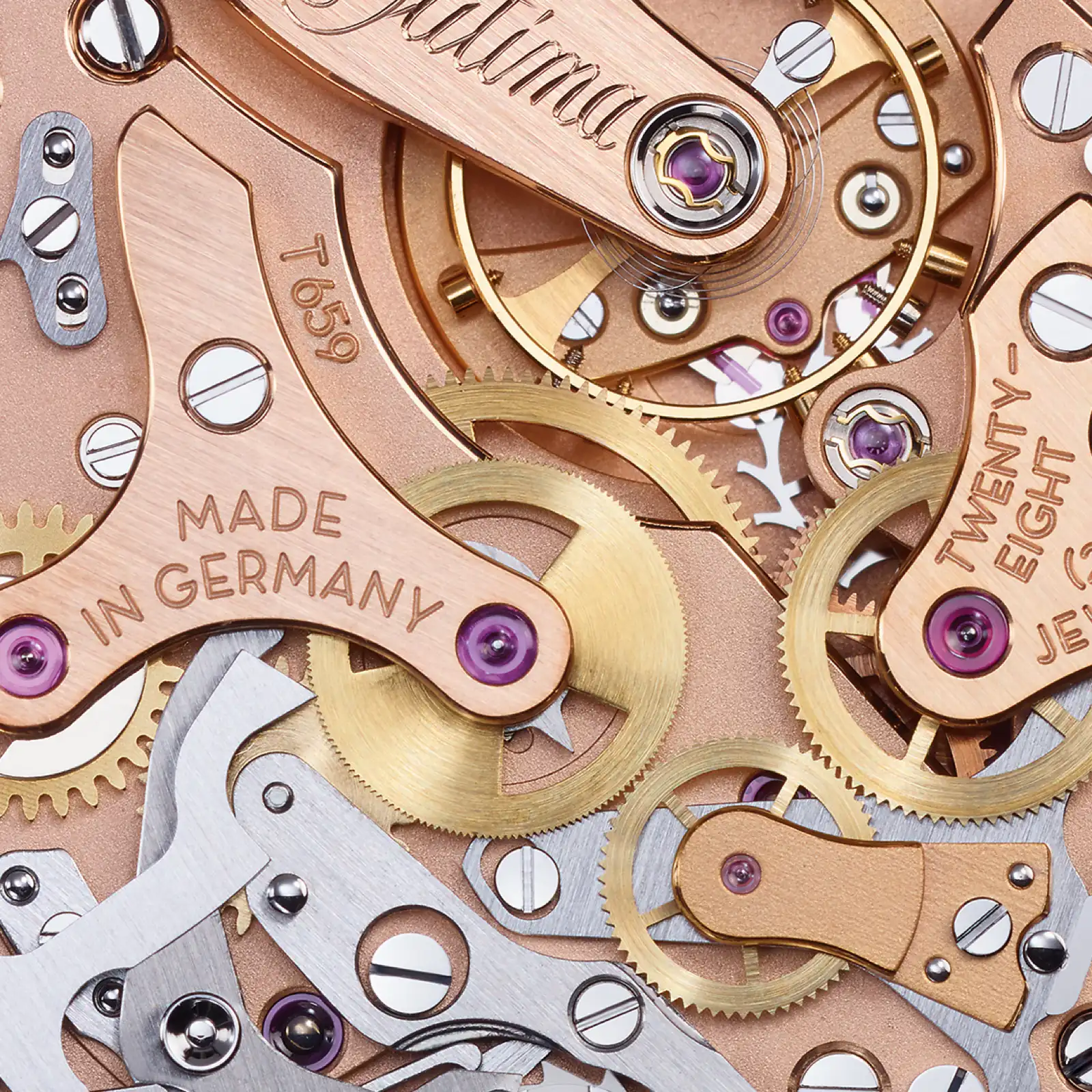 Caliber T659 — Tutima signature and T659 engraving, rose gold plate with gear train and jewel bearings