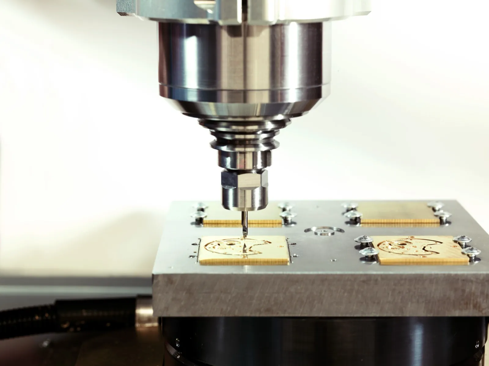 CNC milling a brass movement plate
