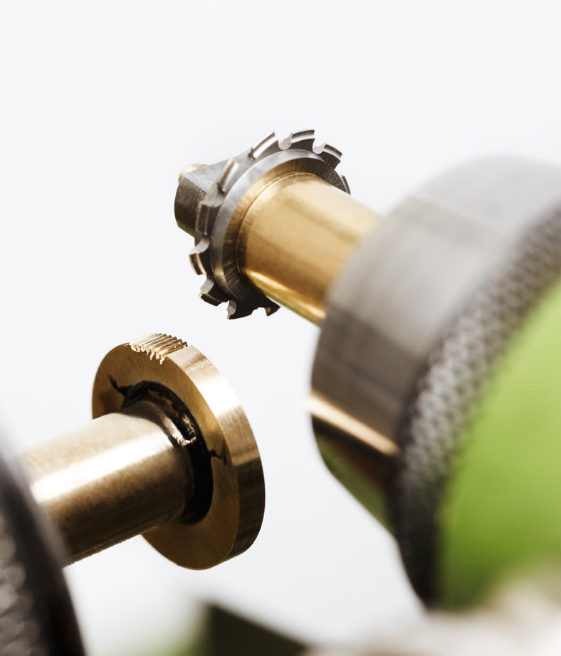 Gear cutters on lathe with bokeh