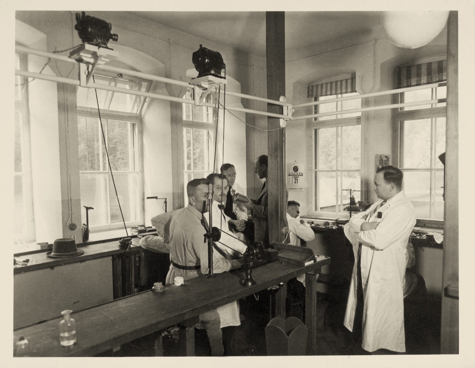 UFAG factory interior, Glashütte, 1930s — watchmakers at their benches