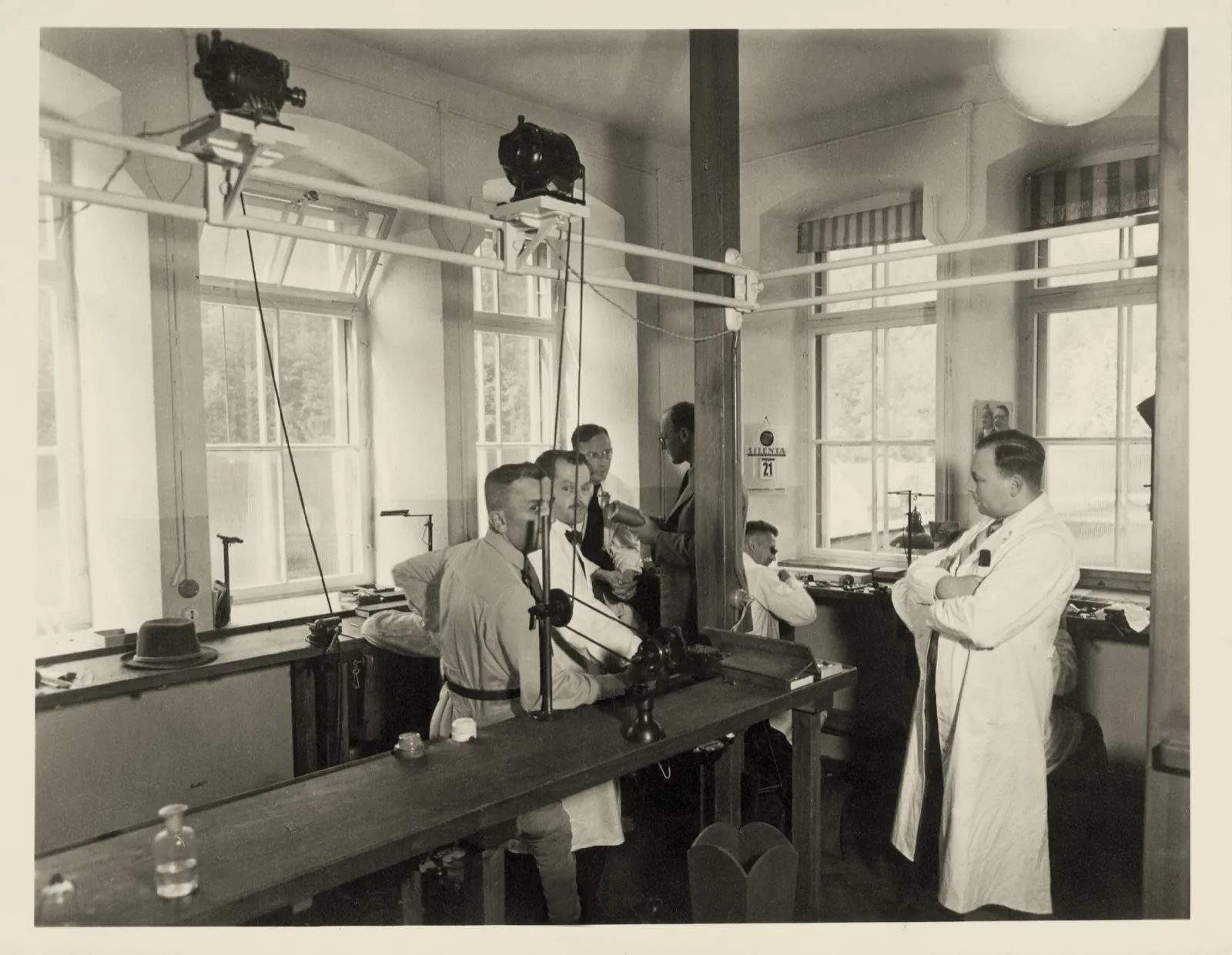 UFAG factory interior, Glashütte, 1930s — watchmakers at their benches