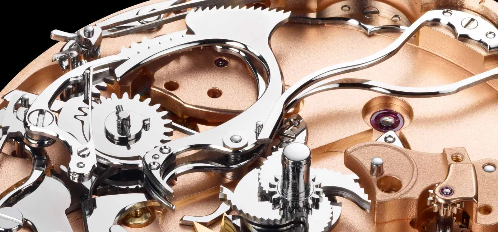 Minute repeater gongs, hammers, and snail cams in close-up