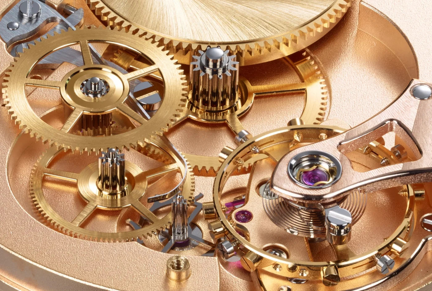 Cal. 617 gear train macro — gold wheels, jewels, and balance with hairspring